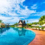 large-pool-with-umbrellas-hammocks