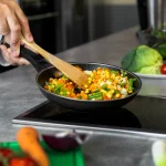 male-chef-kitchen-cooking-dish-frying-pan